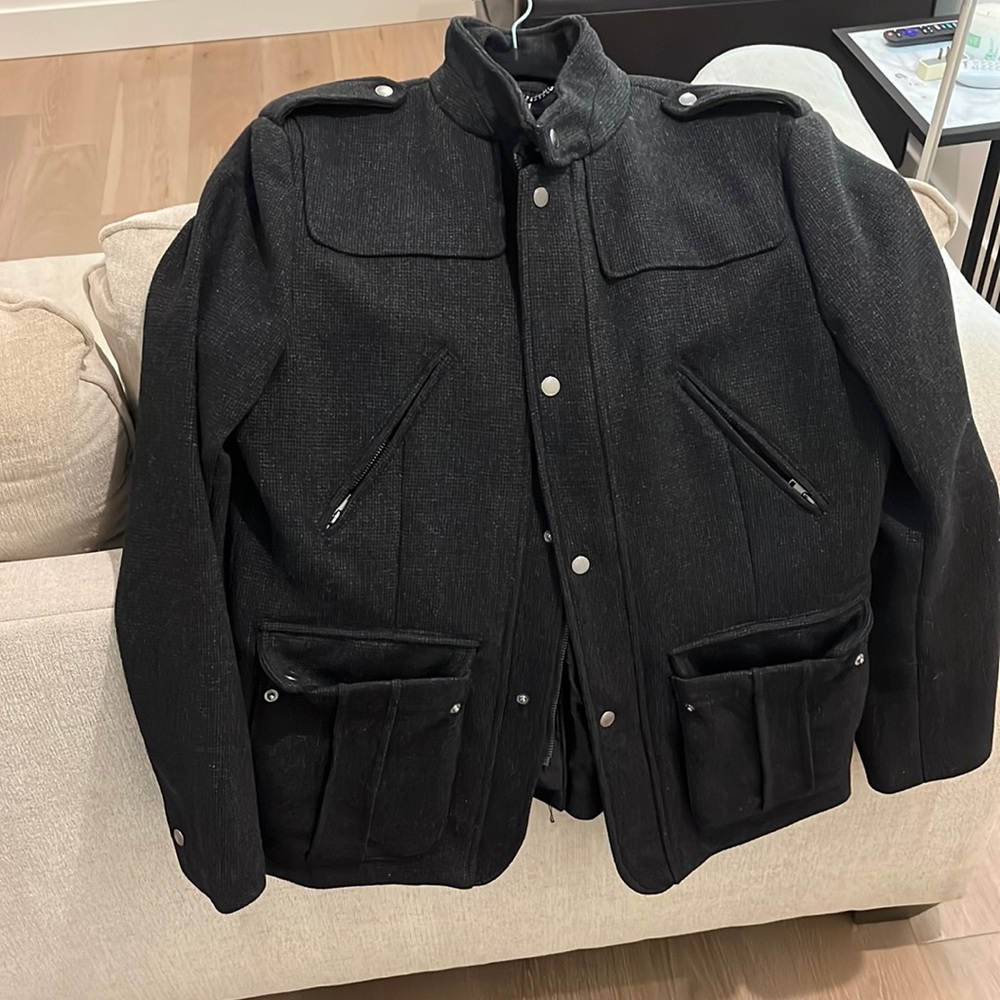 42R H&M black coat. New condition, no marks or tears.